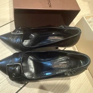 Pre loved excellent condition Louis Vuitton Black Leather pumps with Buckle sz 5